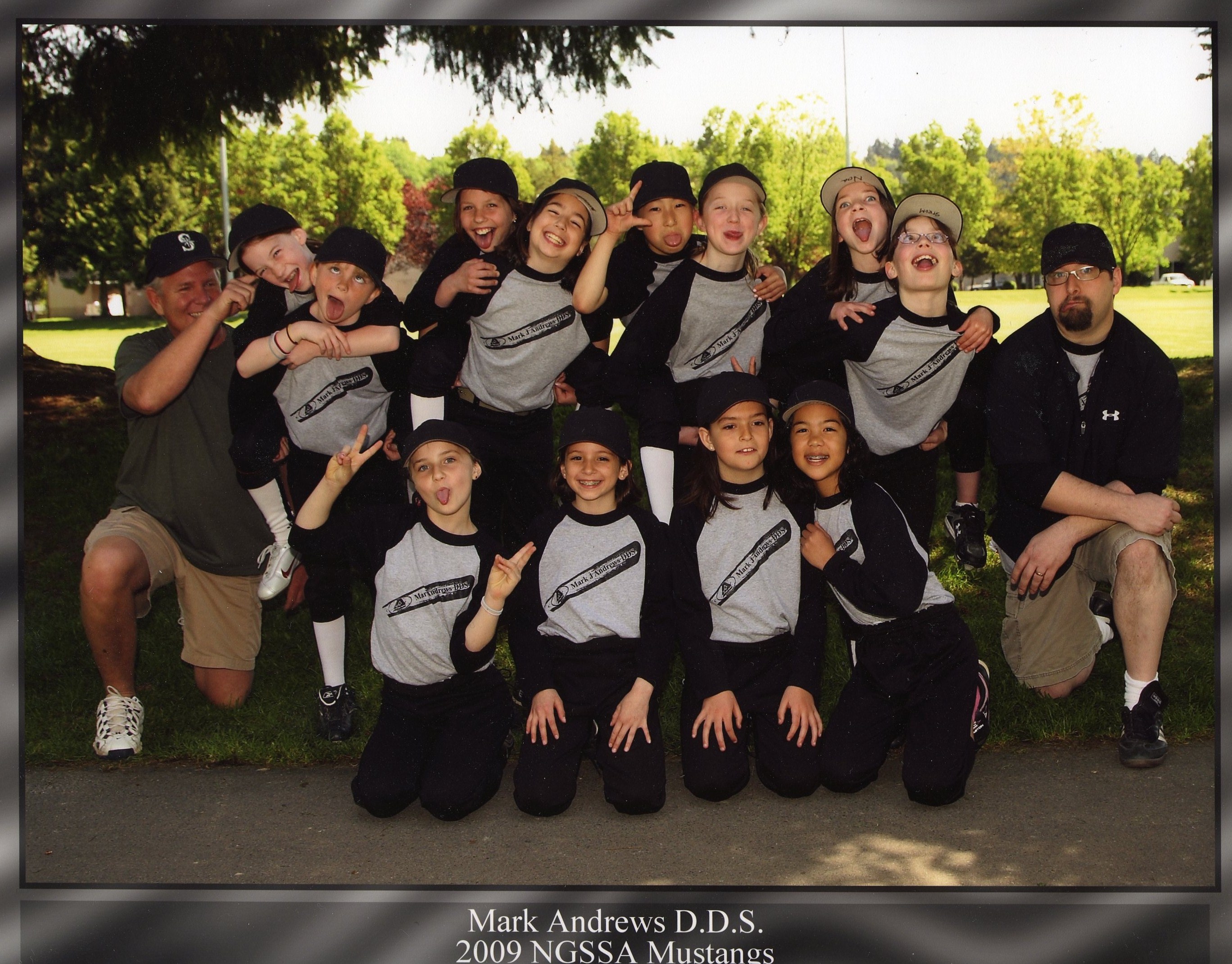 Mark J. Andrews, DDS sponsors local girls softball team